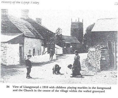 Llangynwyd about 1910, with the church in its walled graveyard
